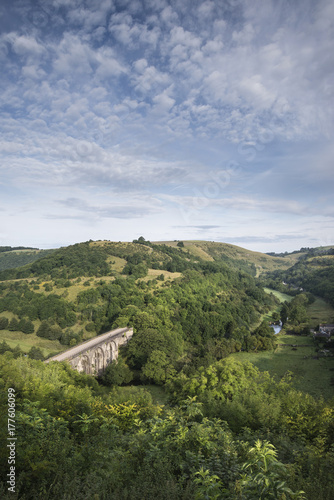 Colorful landscape image of Headstone Viaduct and Monsal Head in Peak District in Summer