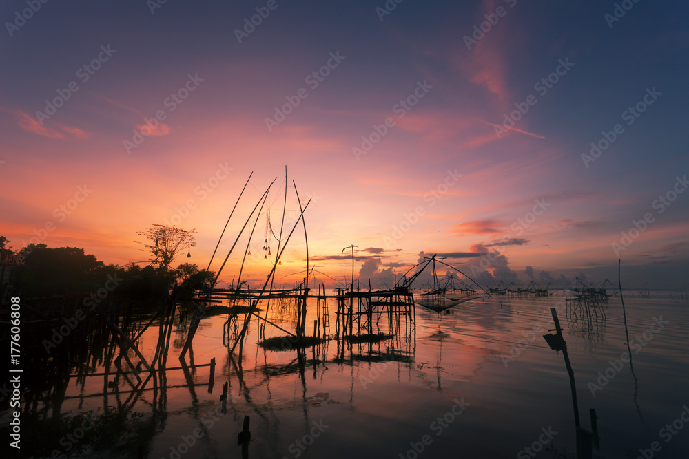 sunrise with fishing trap in pak pra village, Phatthalung Thailand. sunrise with fishing trap in pak pra village, Phatthalung Thailand.