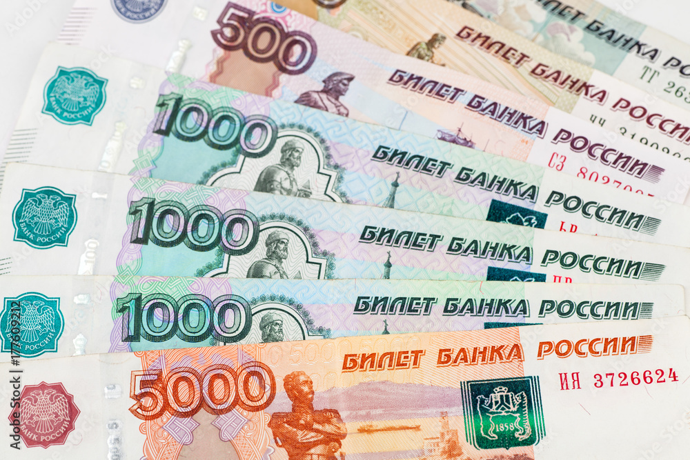 Background of Russian banknotes. Bills of different denominations.