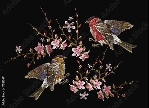 Embroidery birds and blossoming cherry vector. Classical embroidery bullfinch and titmouse on branch blossoming sakura. Spring fashion art, template for design of clothes, t-shirt design