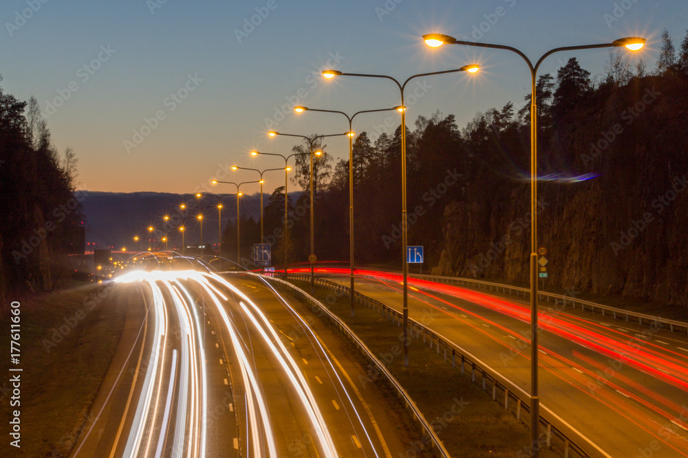 City highway traffic at sunset