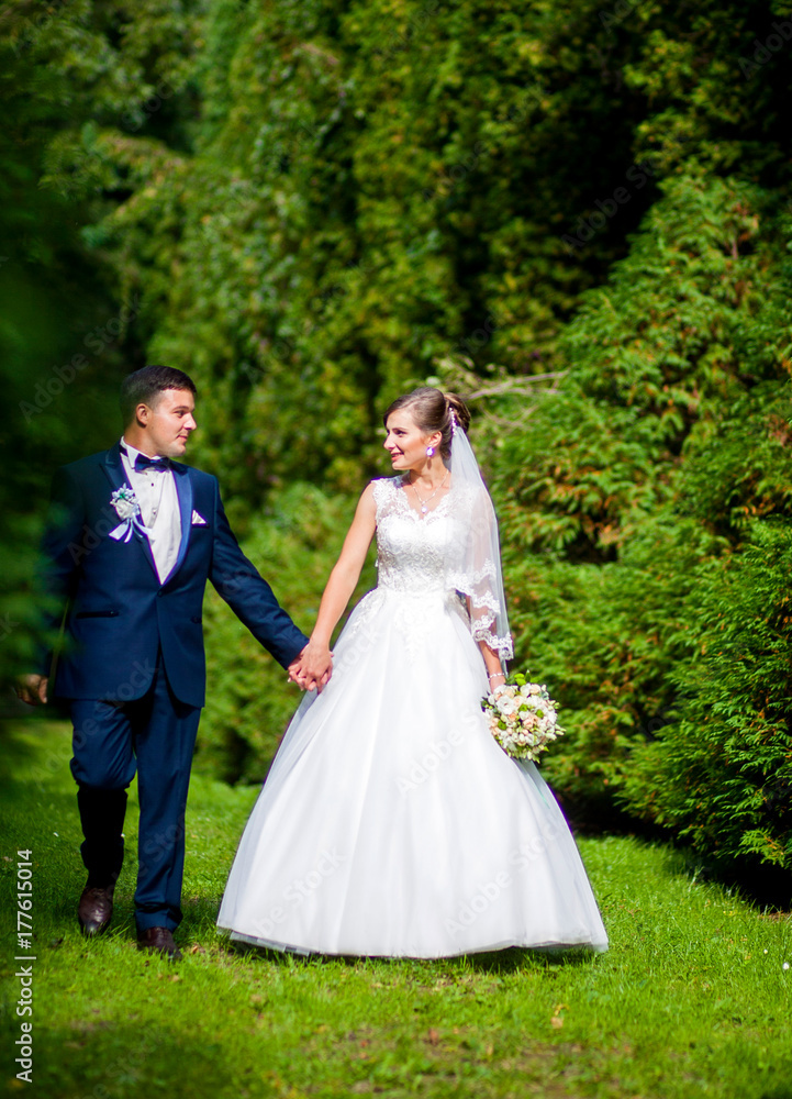 Happy couple walking in the park