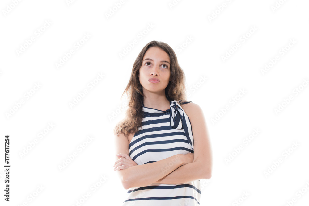 Woman making a choice looking up emotive concept Woman making a choice looking up emotive concept