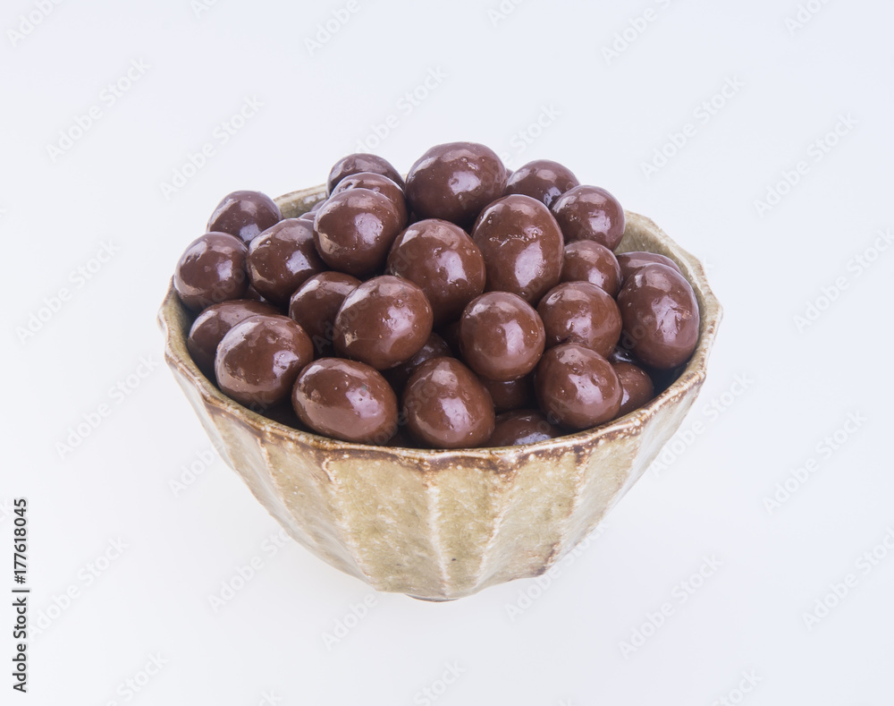 chocolate balls. chocolate balls in bowl on a background chocolate balls. chocolate balls in bowl on a background