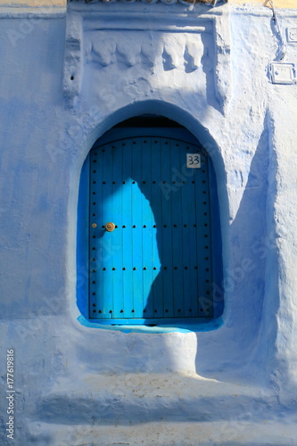 Old blue door of a house in Chaouen, Morocco © juanorihuela
