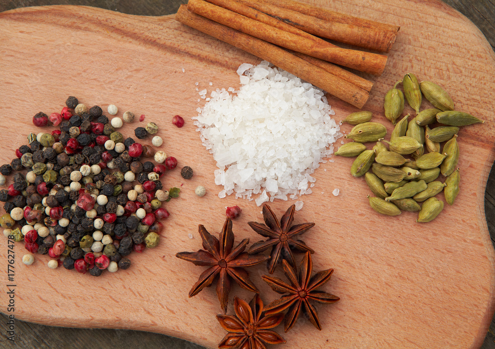 Various seasonings on wooden background Various seasonings on wooden background