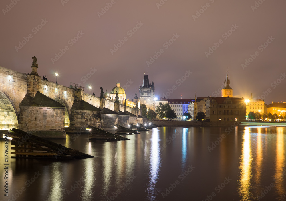 Charles in Prague, Czech Republic. Light of lanterns reflected in the Vltava River