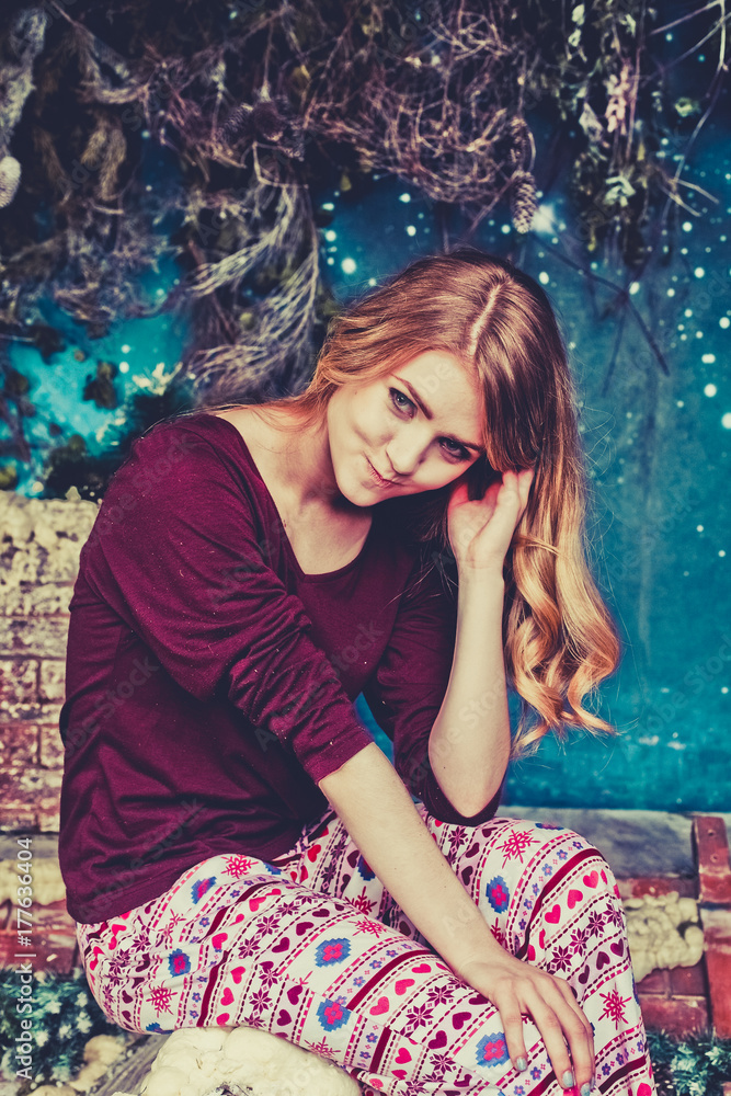 Fototapeta premium Girl on a rooftop in new year/Christmas