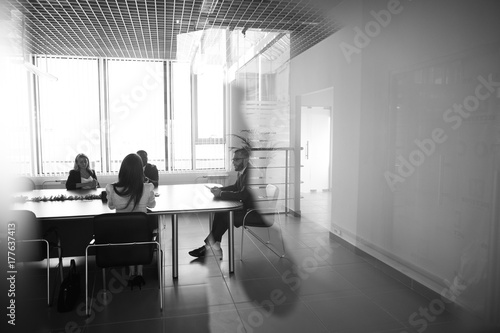 Corporate business team and manager in a meeting, close up photo