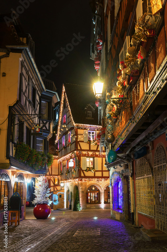 Christmas Colmar  France.Traditional old half-timbered houses in historic city of Colmar decorated and lighted during the Christmas season  Alsace.Beautiful multi-colored Christmas.