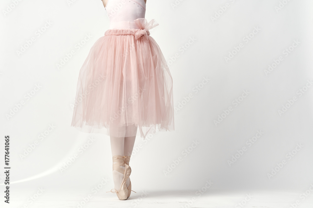 ballet dancer in a dress dancing ballet on a light background, gymnastics tape, art ballet dancer in a dress dancing ballet on a light background, gymnastics tape, art