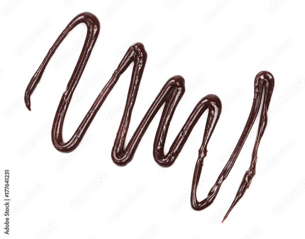 Hot melted chocolate pouring isolated on white background, top view Hot melted chocolate pouring isolated on white background, top view