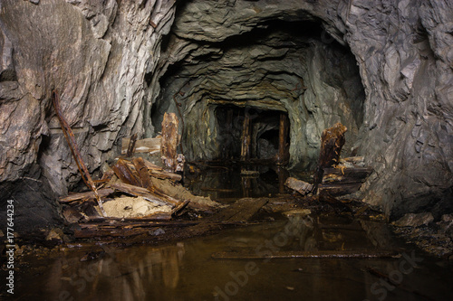 Undeground abandoned old mica ore mine shaft