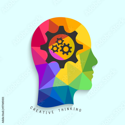 Creative thinking concept with gears and colorful head silhouette made in low poly design