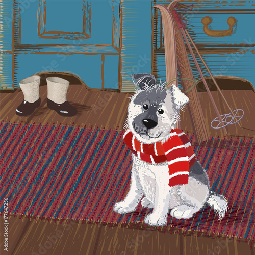 Cute puppy in a striped scarf sits on a rug in anticipation of a winter walk