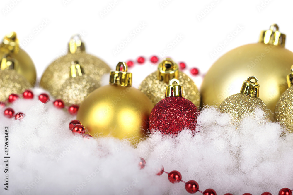 Branch of Christmas tree with short needles decorated toys isolated on white background. Branch of Christmas tree with short needles decorated toys isolated on white background.