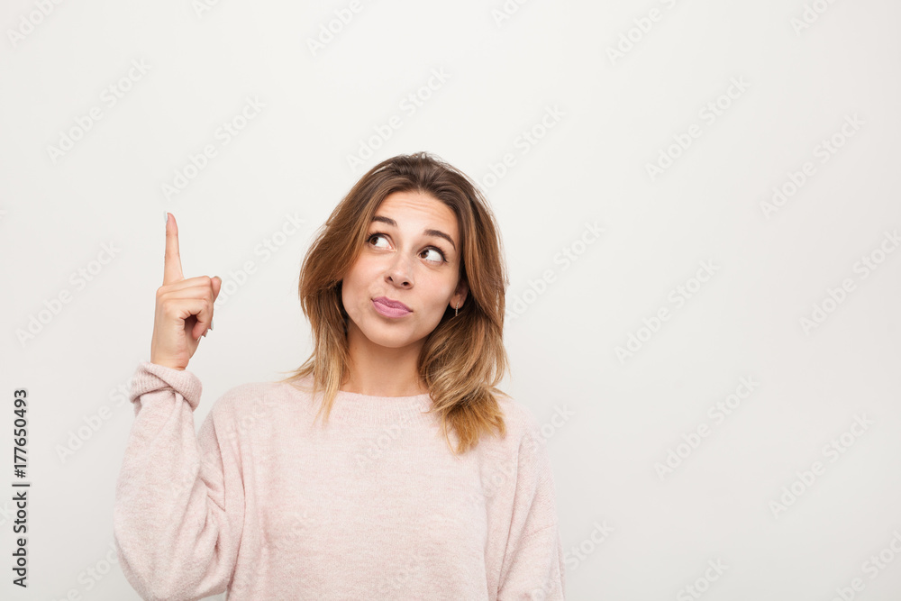 Charming model pointing up Charming model pointing up