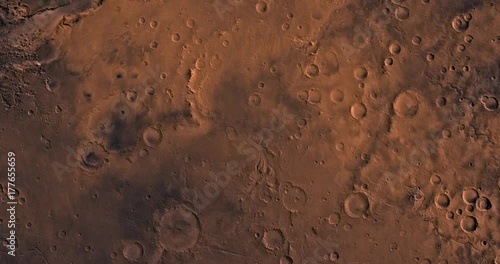 Very high altitude aerial flyover of Mars' western Margaritifer Sinus region. No HUD. Clip is reversible and can be rotated 180 degrees. Data: NASA/JPL/USGS photo
