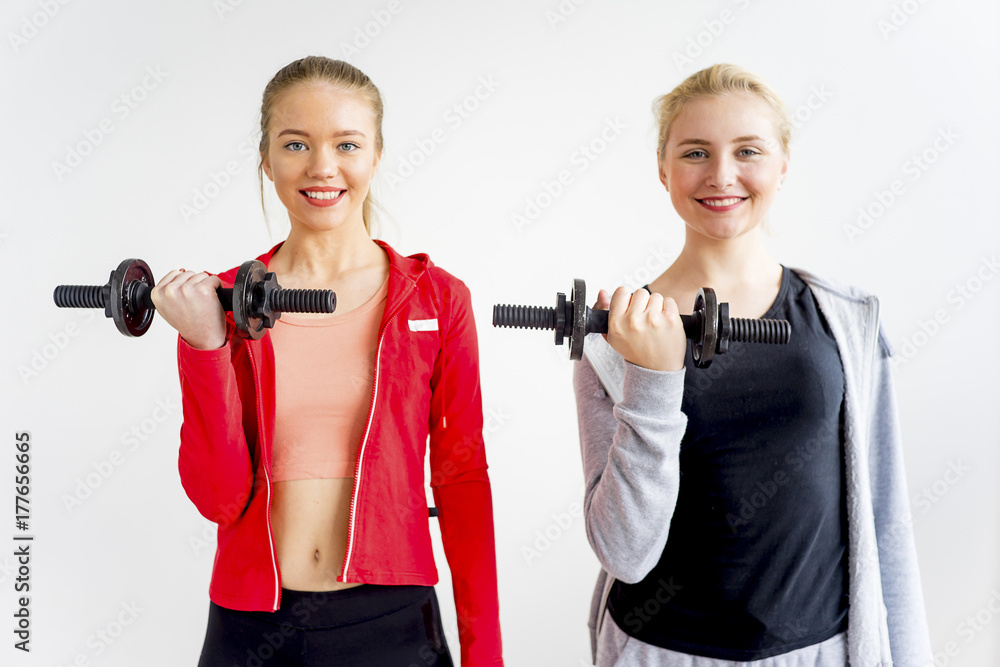 Two girls in a gym Two girls in a gym