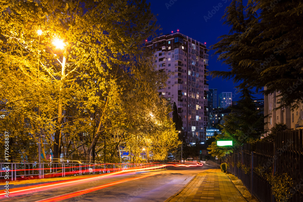 Beautiful view of illuminated Tonnelnaya street at dusk, Sochi, Russia
