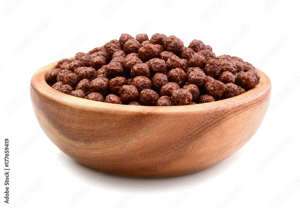 Dry breakfast with chocolate in a wooden bowl Dry breakfast with chocolate in a wooden bowl