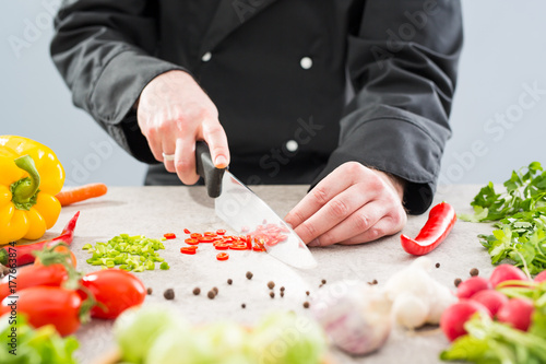 Slicing, chopping and peeling the vegetables cook.