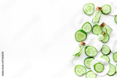 Sliced cucumber for face mask on white background top view copyspace