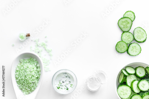 Sliced cucumber for face mask on white background top view copyspace