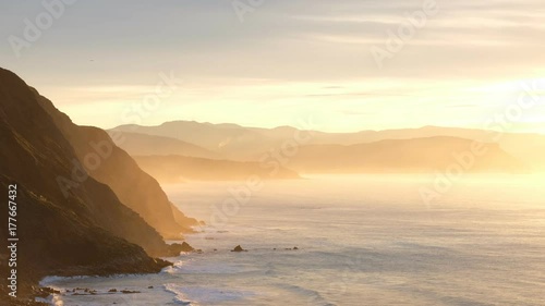 waves of the ocean and rocky coast