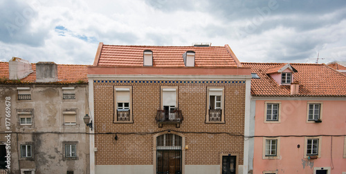 Streets of Lisbon, houses covered with Portuguese tile
