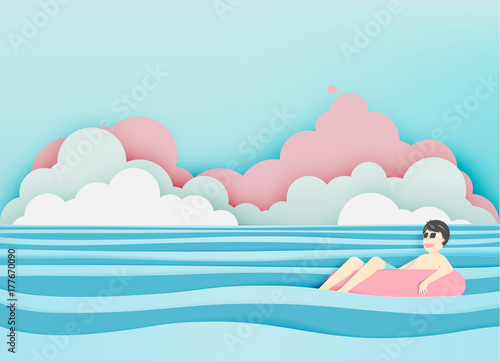 Man floating on the beach with beautiful sea