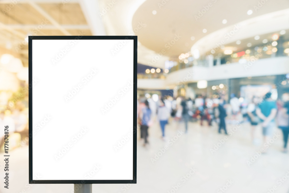Blank mock up of vertical poster billboard sign with copy space for your text message or content in modern shopping mall. Blank mock up of vertical street poster billboard department store background. Blank mock up of vertical poster billboard sign with copy space for your text message or content in modern shopping mall. Blank mock up of vertical street poster billboard department store background.