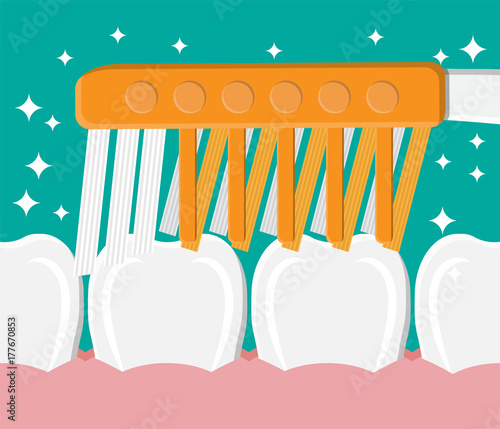 Toothbrush cleans teeth. Brushing teeth.