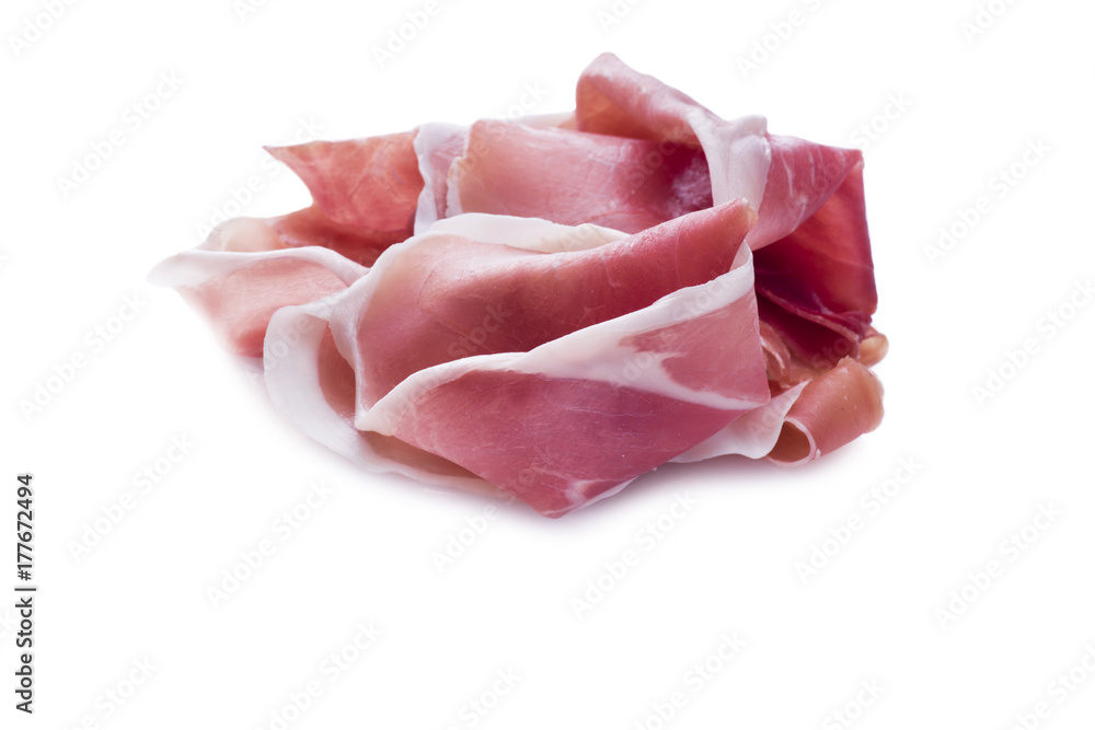 Raw ham leg sliced on the white Raw ham leg sliced on the white