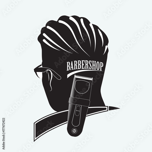 Stylish Barber Shop
Logo for the Barber shop. Silhouette of man in glasses with an inscription on the back of the head. Clipper symbolizes hairdressing