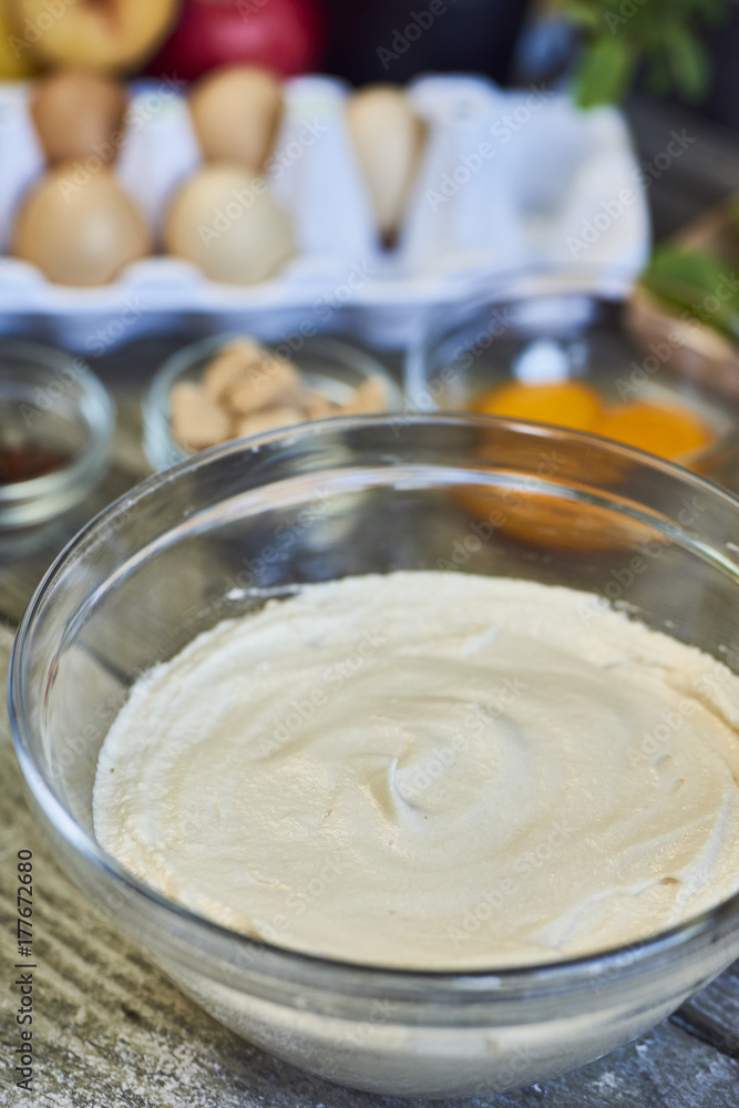 A beautiful rich and creamy , white whipped meringue mixture in a large mixing bowl. A beautiful rich and creamy , white whipped meringue mixture in a large mixing bowl.