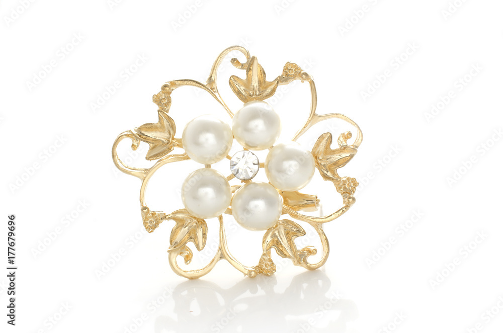 gold brooch flower with pearl isolated on white gold brooch flower with pearl isolated on white