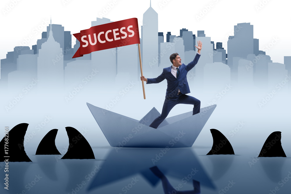 Obraz premium Businessman riding paper boat ship in success concept