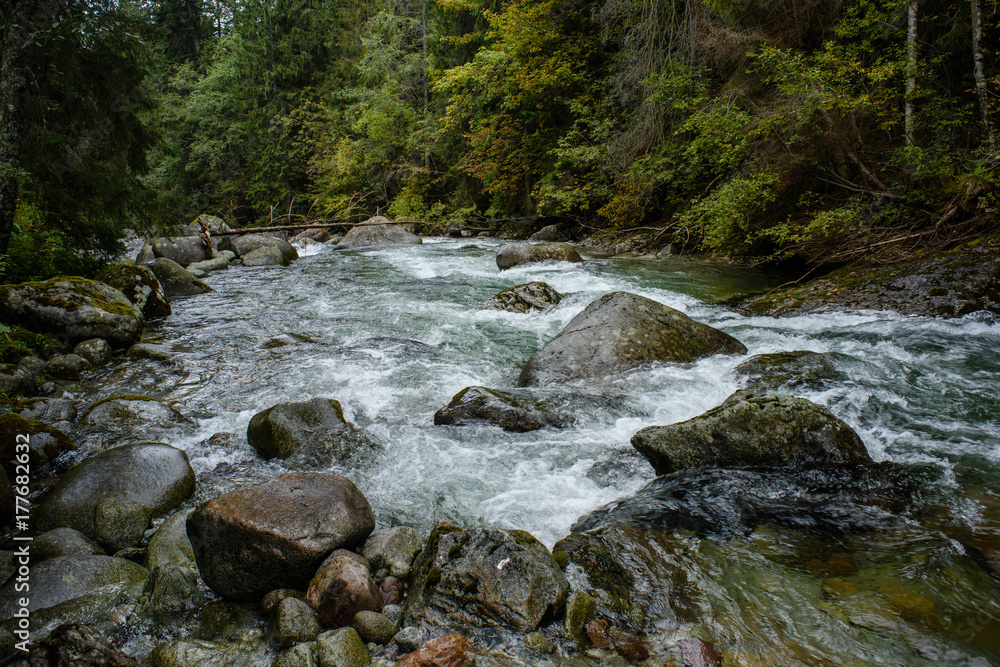 Waterfall from ravine in autumn, long exposure Waterfall from ravine in autumn, long exposure