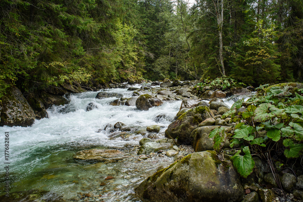 Waterfall from ravine in autumn, long exposure Waterfall from ravine in autumn, long exposure