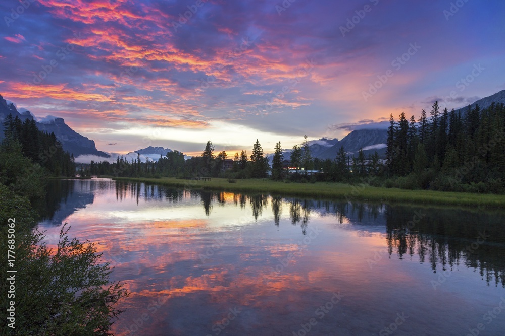 Alberta Foothills Dramatic Burning Red Sunset Sky Landscape in City of Canmore after late afternoon Canadian Rockies summer thunderstorm 