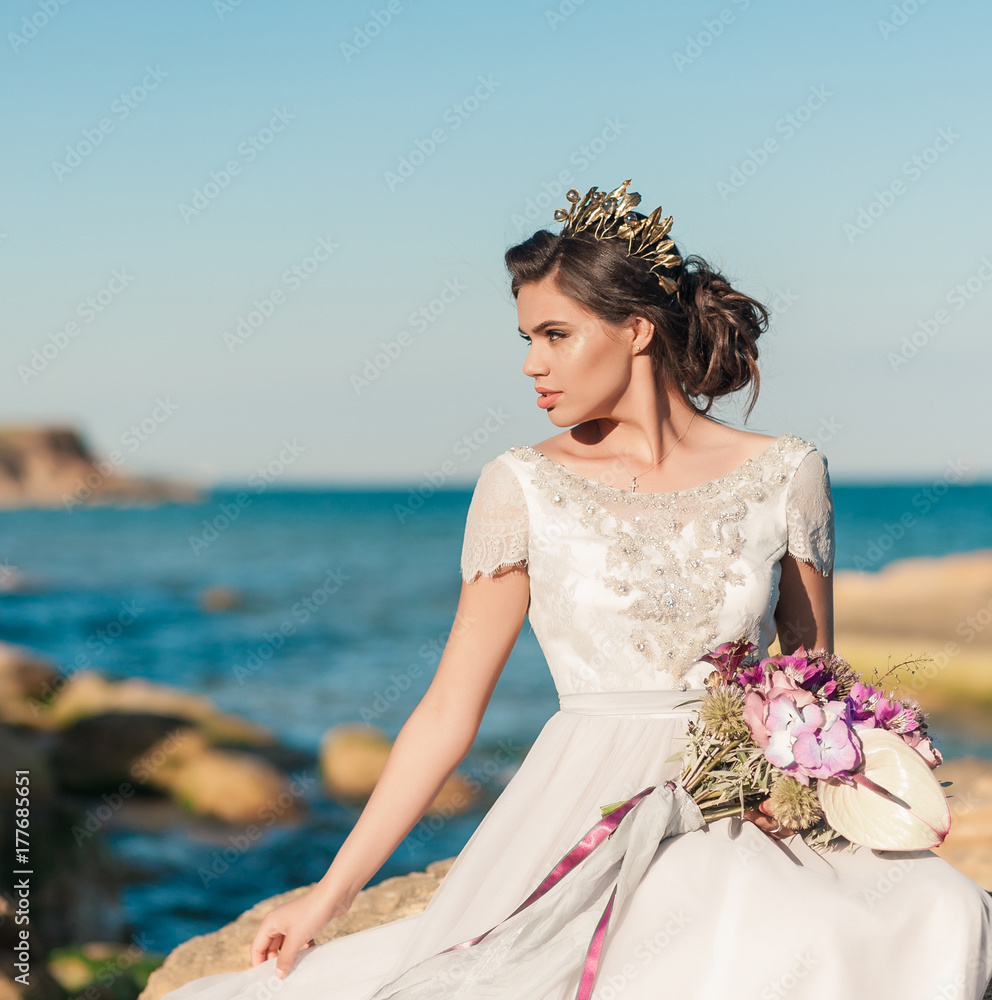 Beautiful bride outdoors. Wedding hairstyle and make up outdoors Beautiful bride outdoors. Wedding hairstyle and make up outdoors