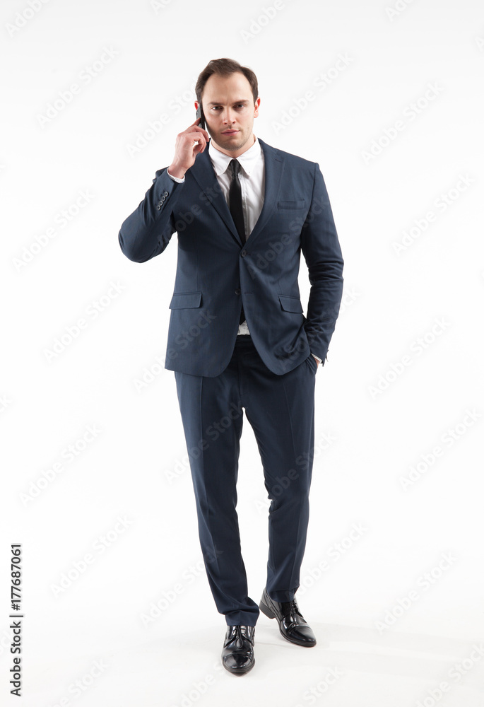Portrait of a businessman with smartphone on white background Portrait of a businessman with smartphone on white background