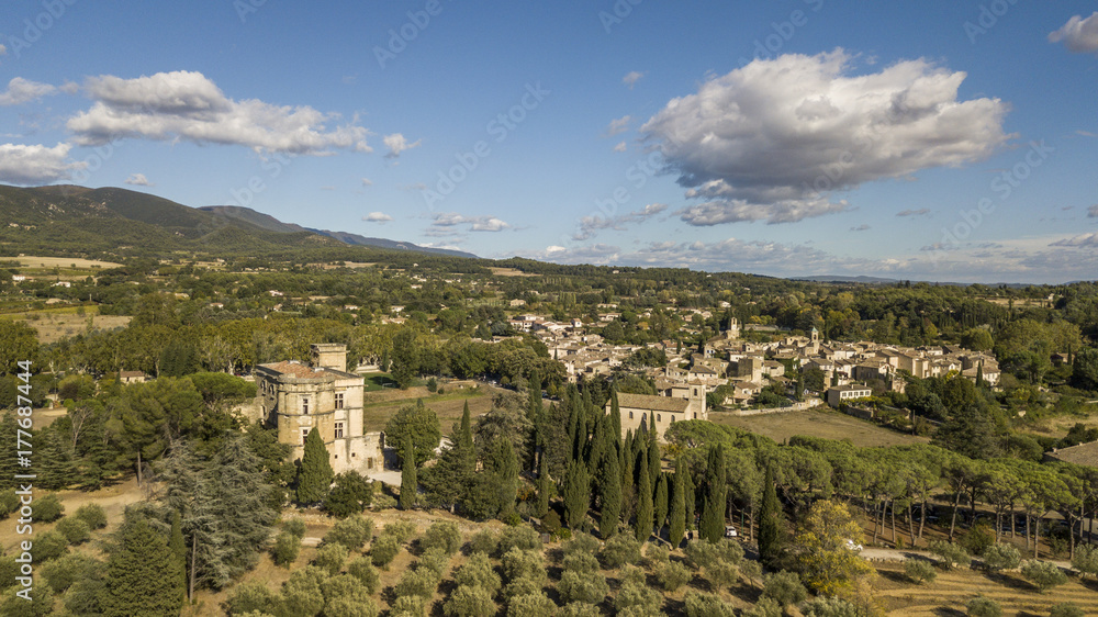 Aerial view of Lourmarin castle and village in southeastern France