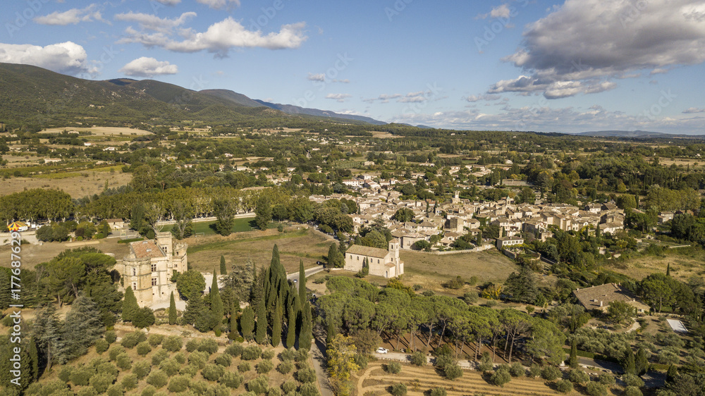 Aerial view of Lourmarin castle and village in southeastern France