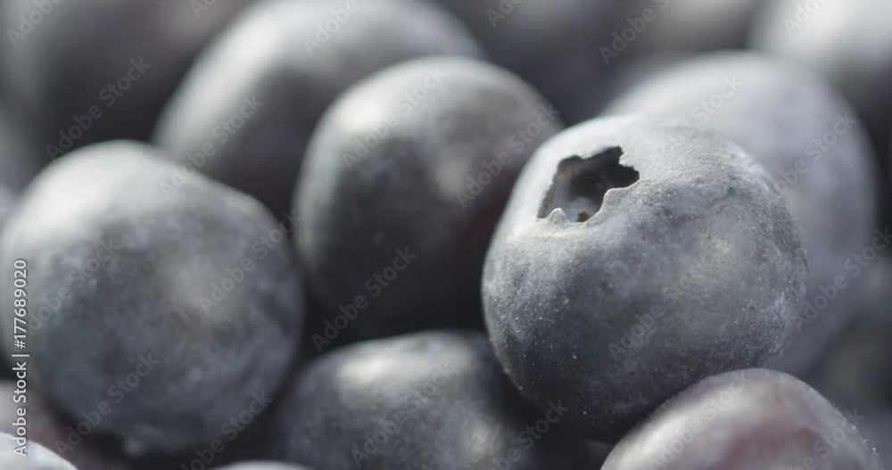 Macro extreme close up of a healthy heap of fresh blueberries. Macro extreme close up of a healthy heap of fresh blueberries.