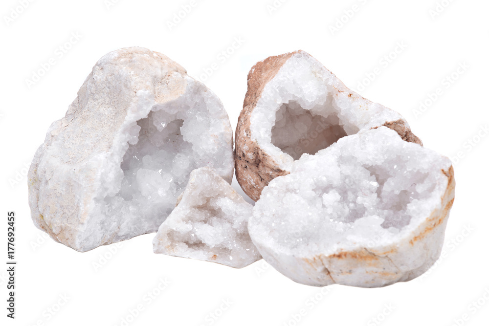 Collection of clear crystal quartz geodes with crystalline druzy center isolated on white background Collection of clear crystal quartz geodes with crystalline druzy center isolated on white background