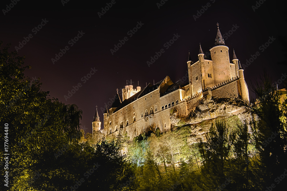 Long exposure of Segovia Alcazar in Spain with the only illumination of street lights. In 1985 the old city of Segovia and its Aqueduct were declared World Heritage Site