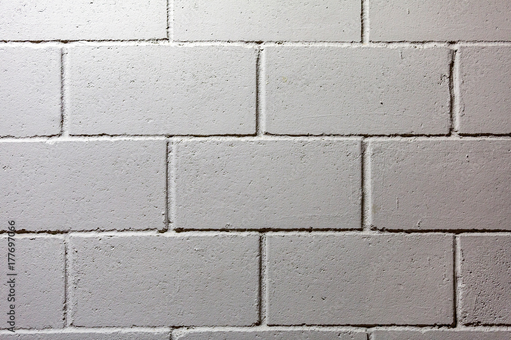 Textured surface of the gray painted brick wall
Textured surface of the gray painted brick wall