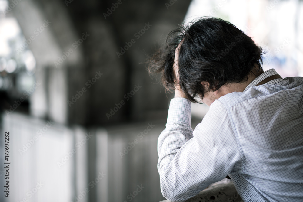 business man is stressed from his work. depression and anxiety concept. business man is stressed from his work. depression and anxiety concept.